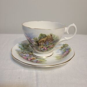 Elegant Cottage Scene Teacup and Saucer Set